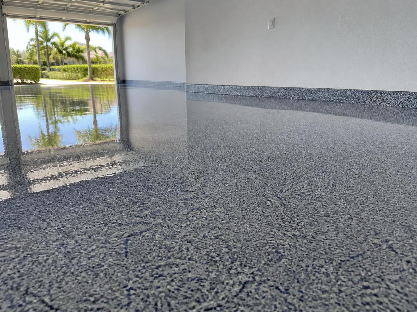 Finished blue-gray flake epoxy garage floor coating in Rockledge, FL
