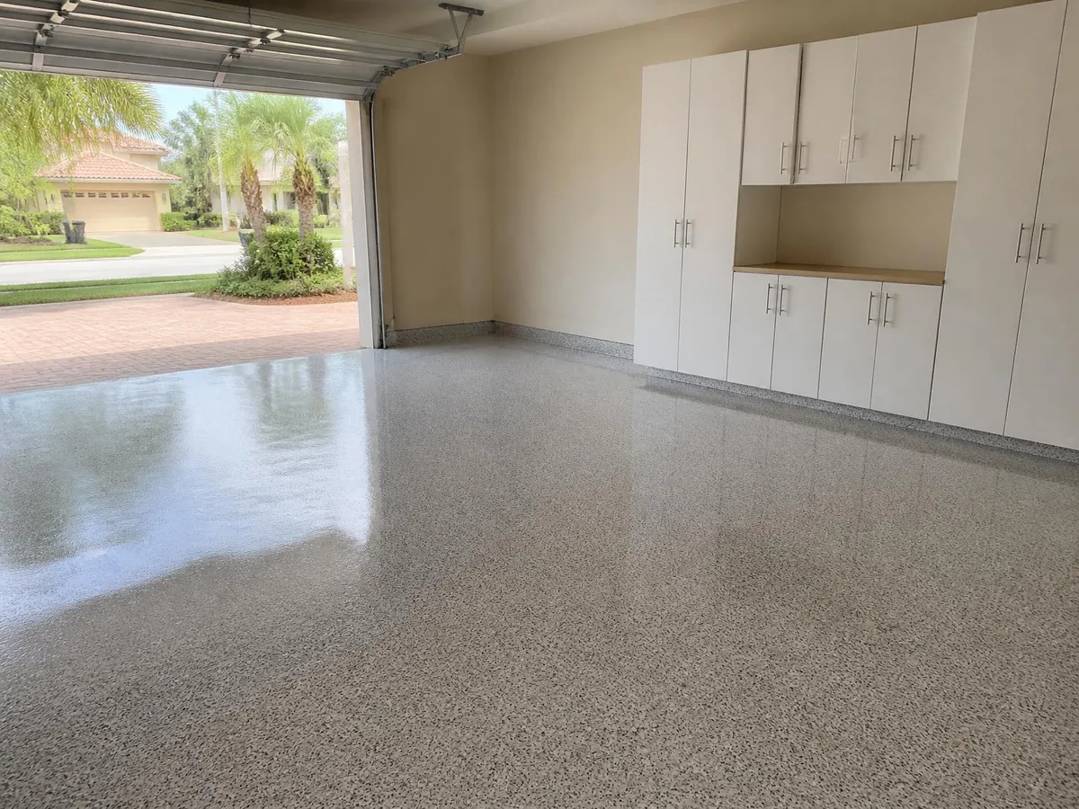 High-gloss white flake epoxy garage floor in Melbourne, FL