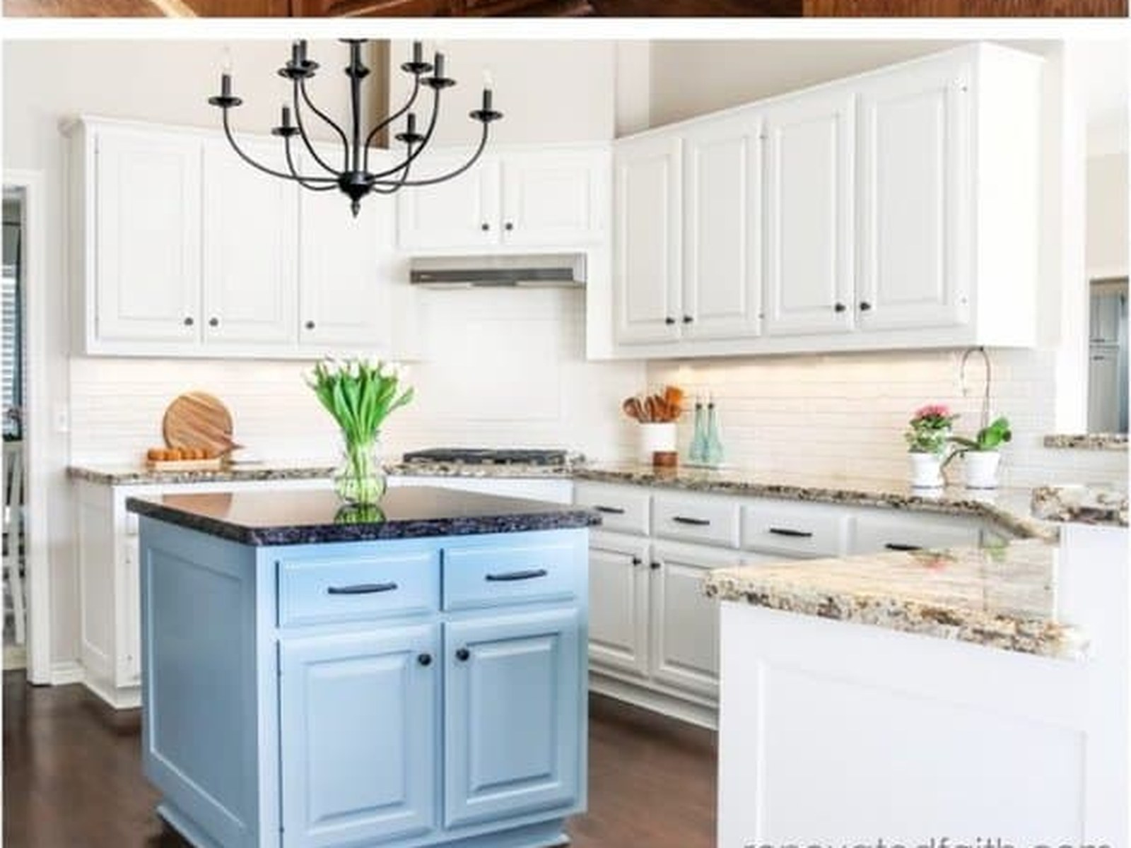 White refinished cabinets with a navy blue painted island in Melbourne, FL