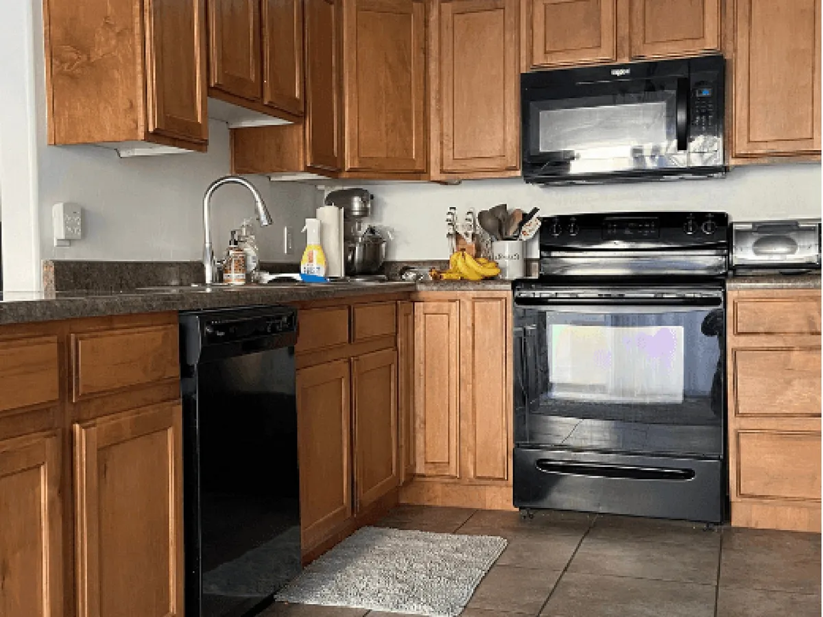 Maple kitchen cabinets before refinishing in Palm Bay, FL