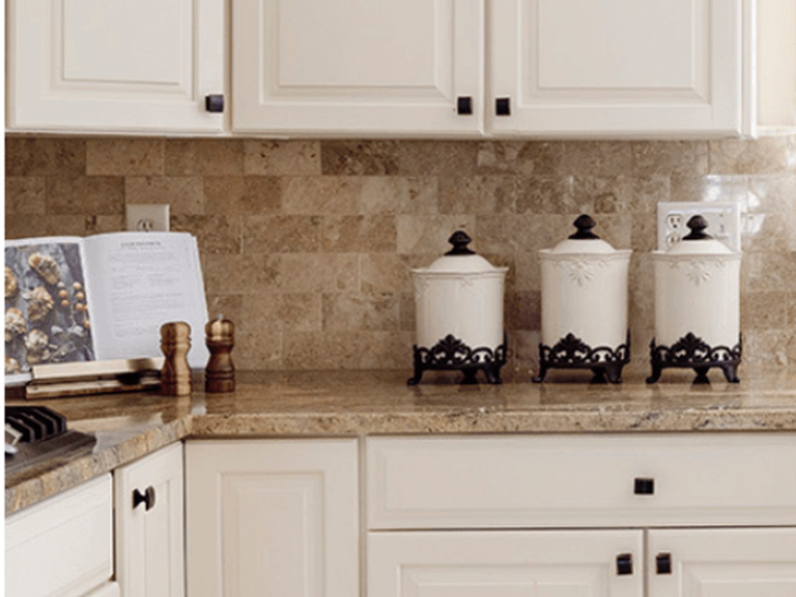 Antique white refinished kitchen cabinets in Suntree, FL