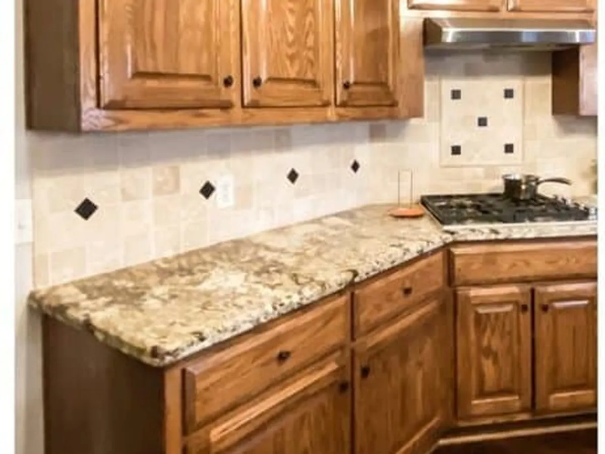 Honey oak cabinet doors before spray refinishing in Viera, FL